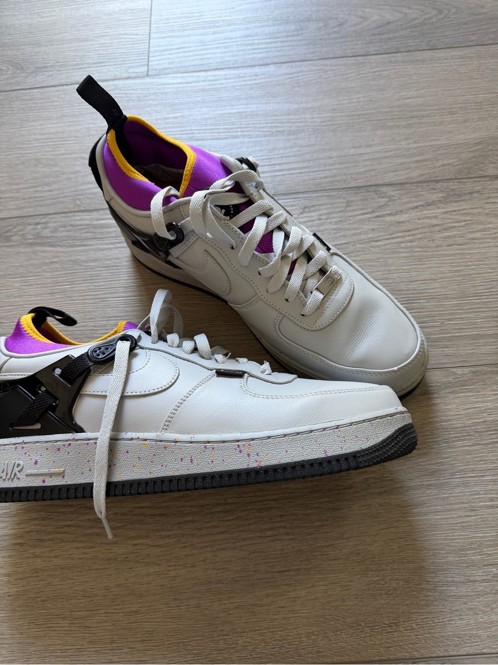 Nike White Sneakers with Purple & Yellow Accents